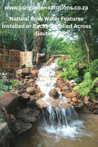 Natural rock waterfall feature with Magalies, Delmas & Rustenburg rocks, boulders & pebbles in Johannesburg garden