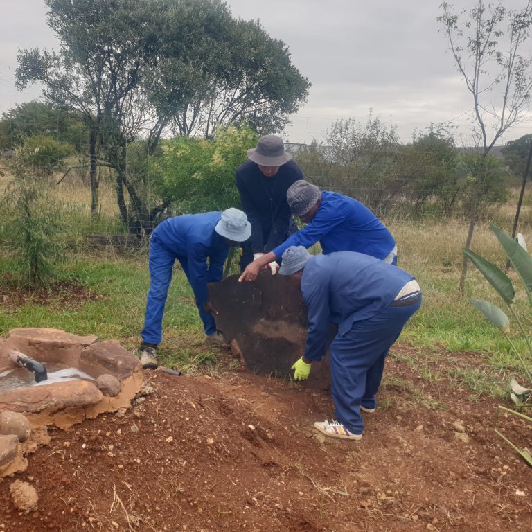 Natural boulder rock water feature and watering hole at a private game farm in Roodepoort, Gauteng – perfect for wildlife viewing near Johannesburg