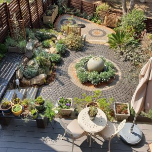 Garden oasis with water feature and custom paving in a private landscaped garden Johannesburg